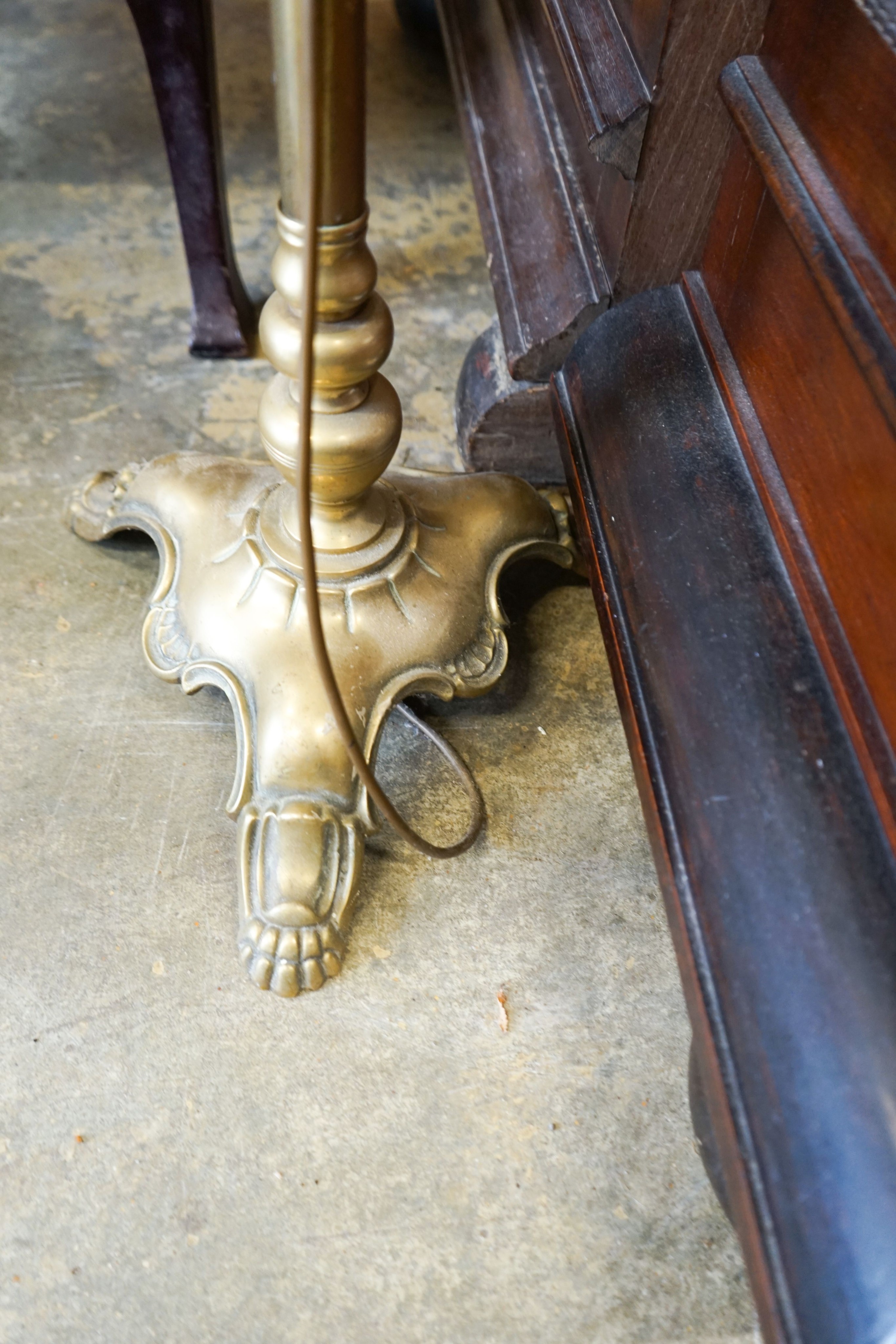 Two early 20th century copper and brass standard lamps, larger height 169cm
